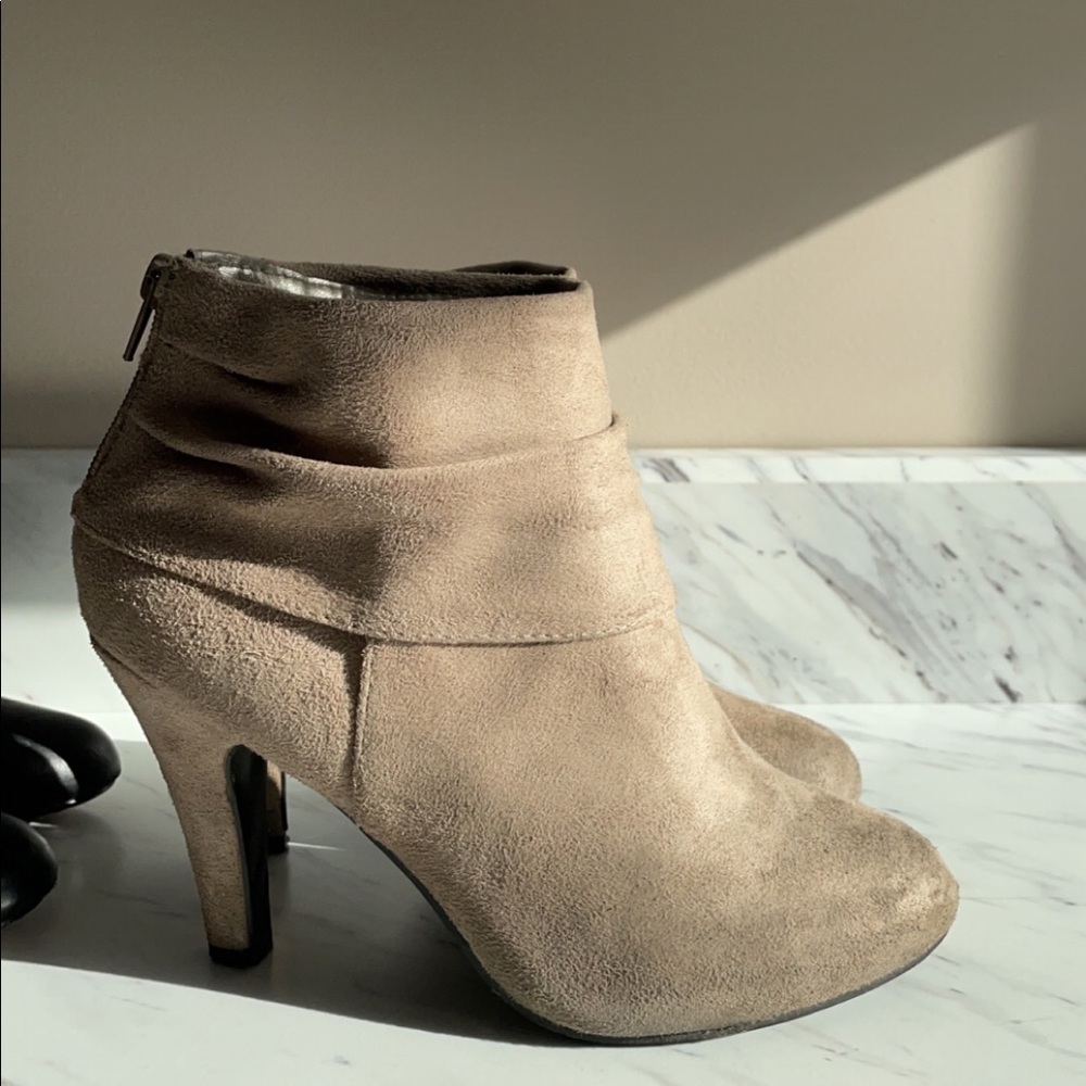 Francesca’s tan heel booties